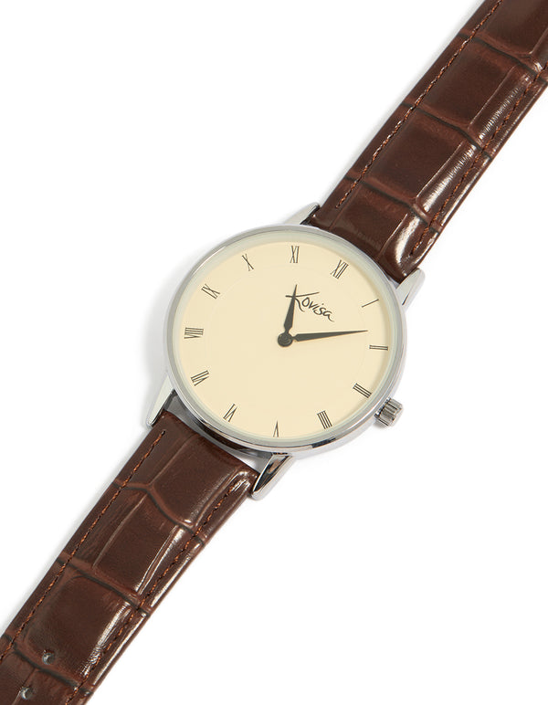 This vintage style mens watch features a snake skin textured brown leather strap with white roman numeral dial and round shape crafted from PU material for formal occasions in analog format watch face detail view