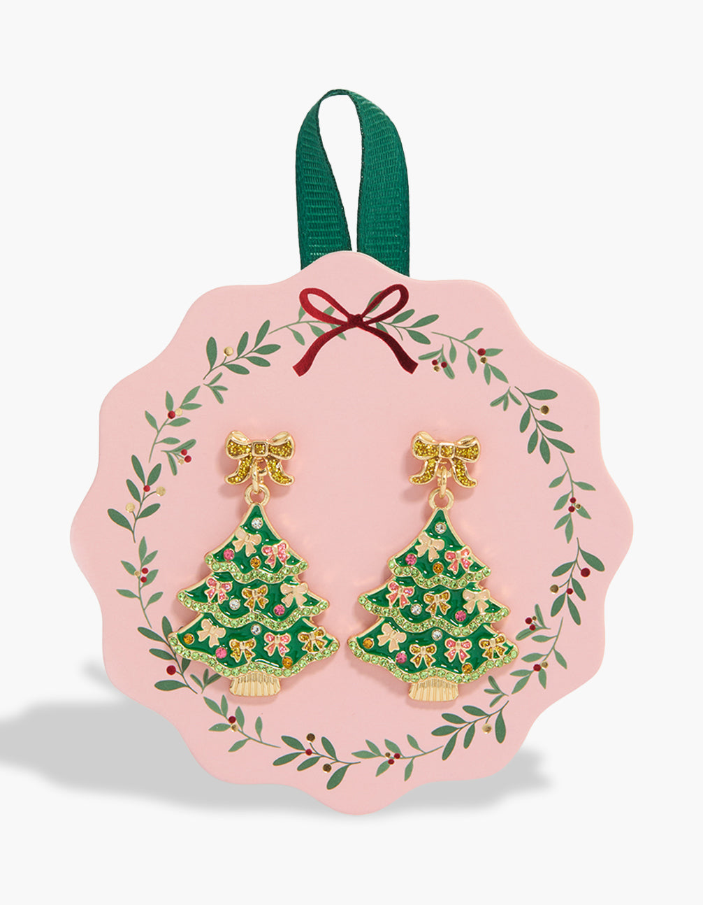 Dainty drop earrings featuring bow and Christmas tree charms with glitter accents in gold, red, and green tones front view