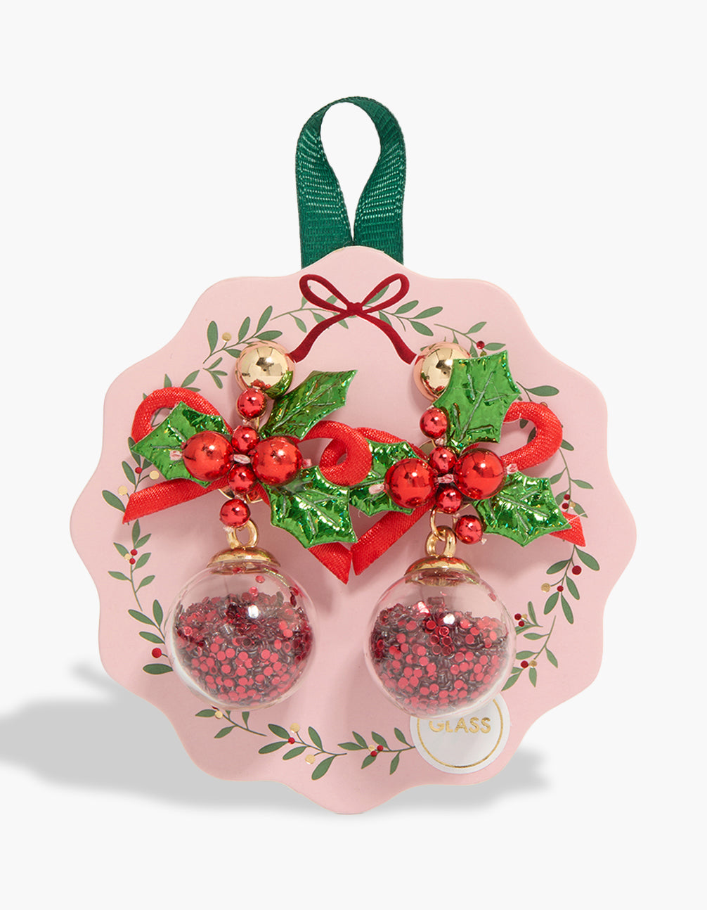 Showcasing gold holly shaker earrings with statement design featuring bow, bell, leaf and glitter in red front view