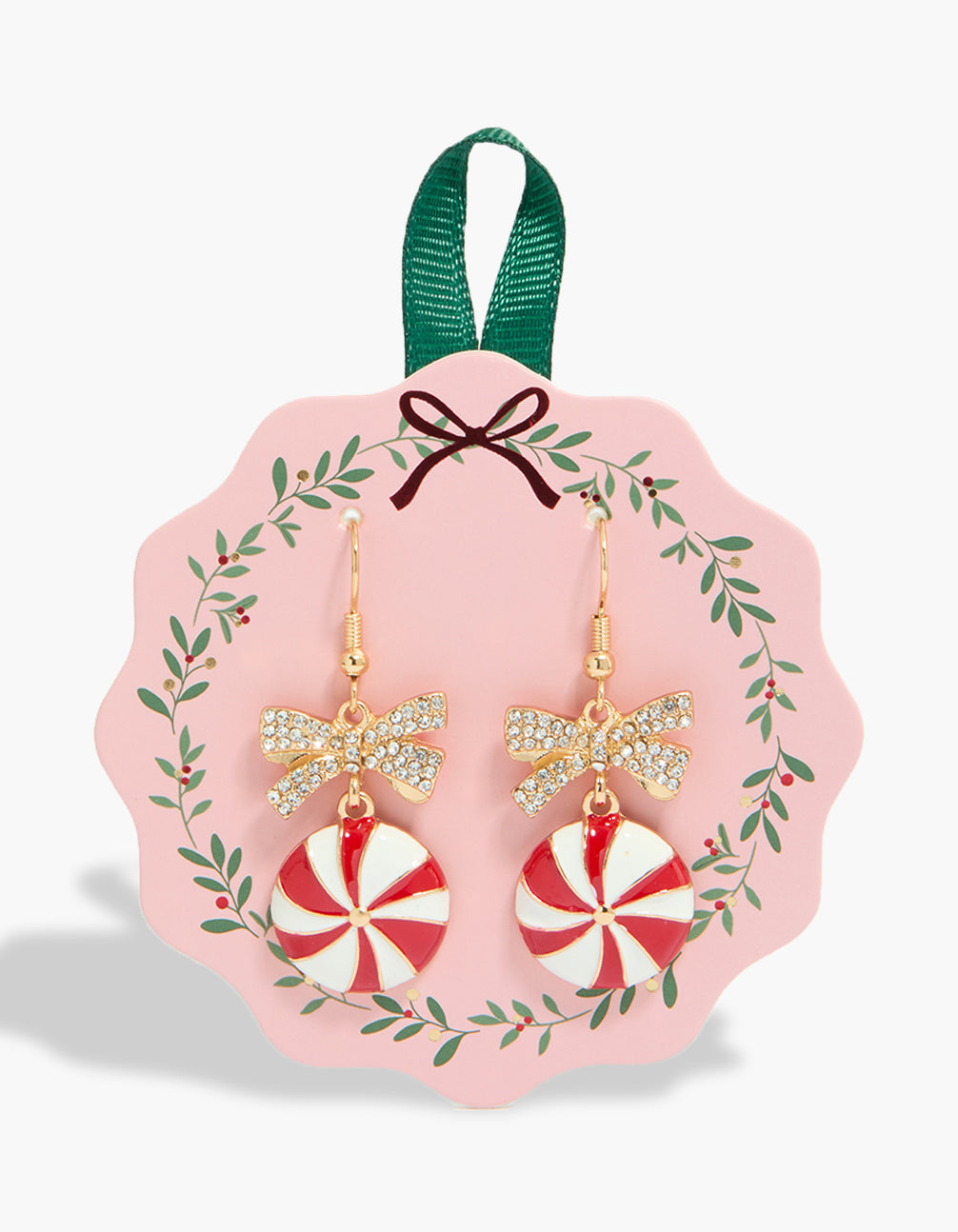 Showcasing statement gold diamante bow and striped lolly earrings with red, white, and clear stone front view