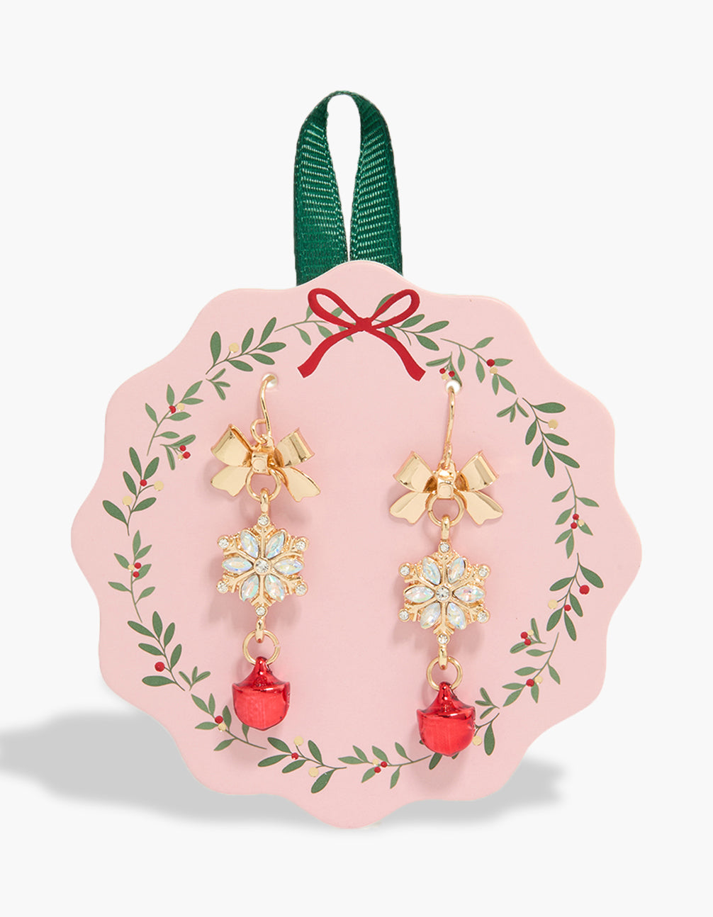 Showcasing gold bow diamante snowflake and bell earrings front view