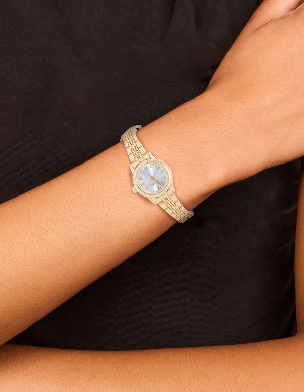 Discover this gold plated mini round watch with white dial showcasing roman numerals, women's formal analog timepiece with link-band strap and statement styling on wrist view