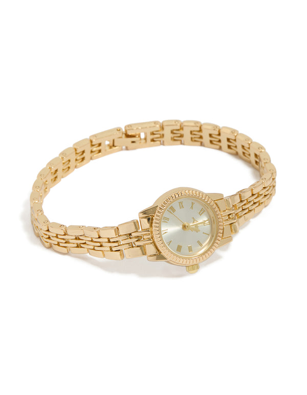 Beautifully crafted, this gold plated mini round watch with white dial showcasing roman numerals, women's formal analog timepiece with link-band strap and statement styling view