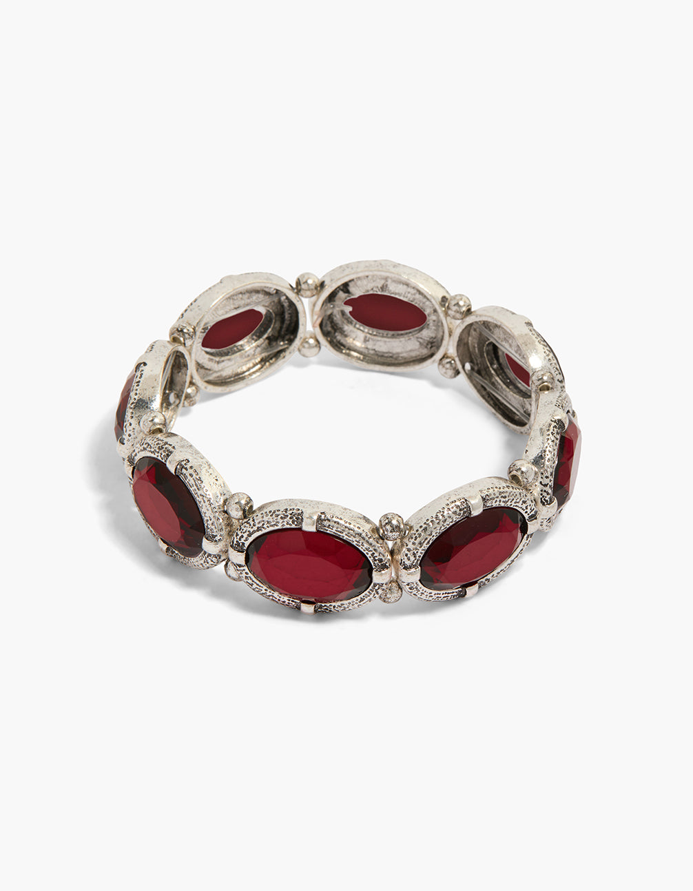 Statement silver bracelet featuring burgundy oval diamantes in front view