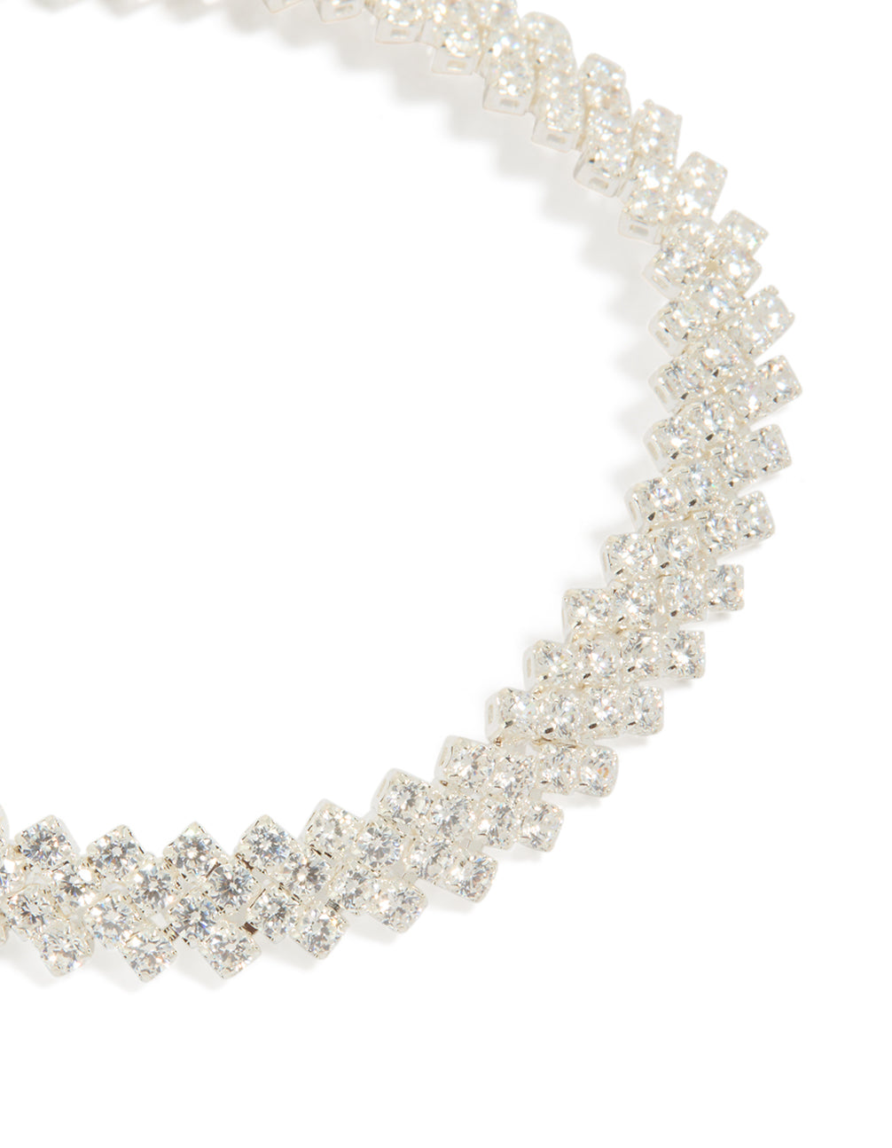 Highlighting the diagonal round cubic zirconia pattern of this silver plated bracelet close up view