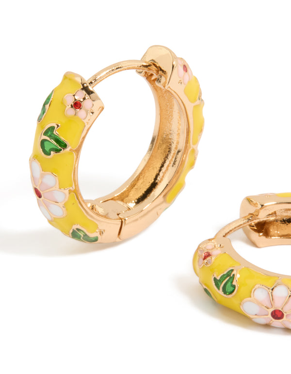 Discover thick huggie earrings with floral leaf pattern in enamel yellow pink green gold close up view