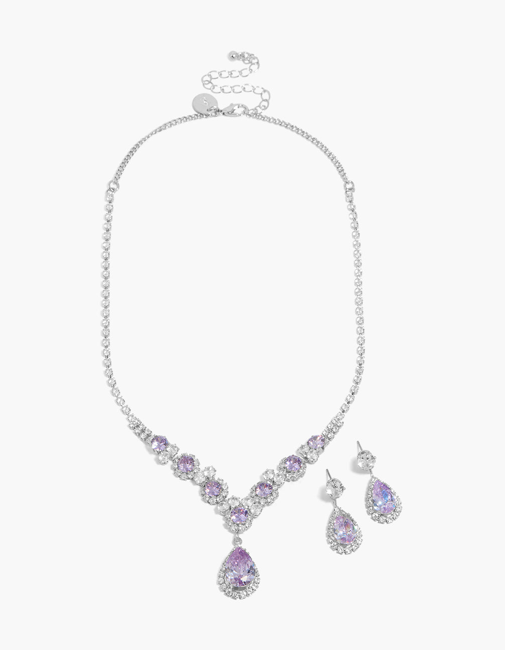 Featuring a silver necklace and earrings set with lilac purple cubic zirconia front view