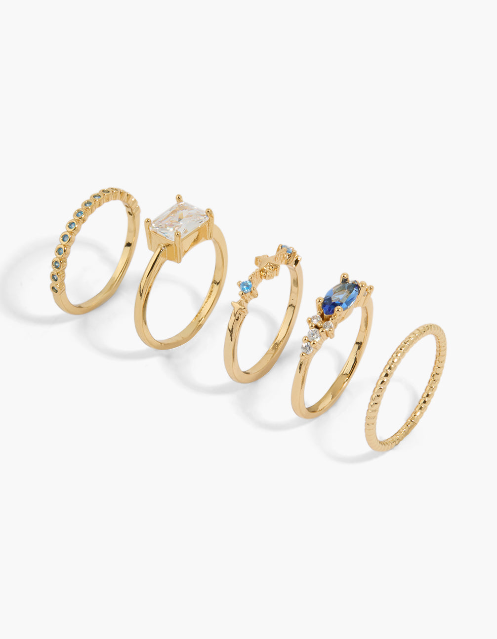 Showcasing a gold plated multicoloured cubic zirconia 5-pack featuring celestial star, baguette, oval and solitaire cut crystal stones front view