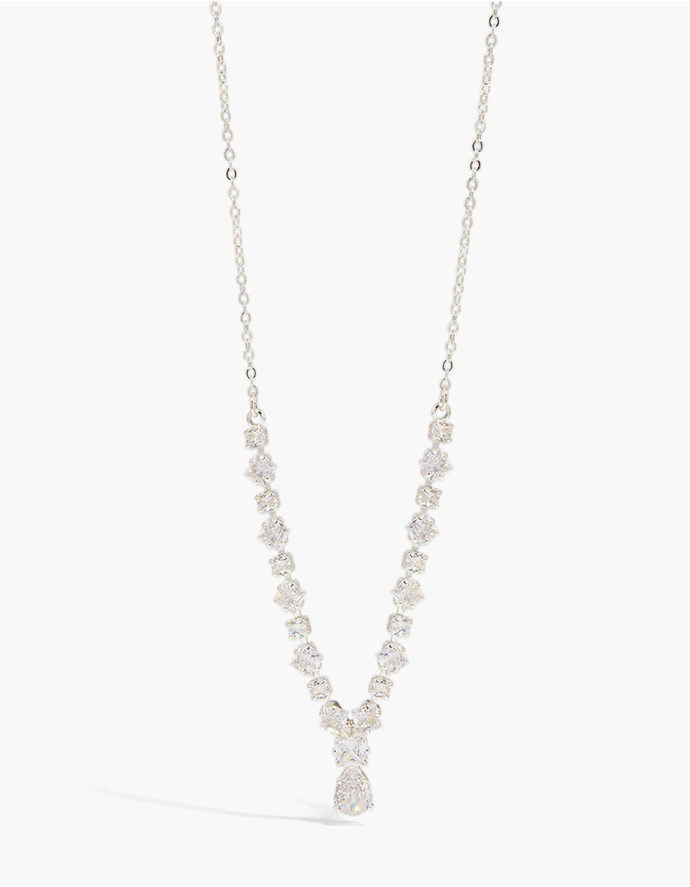 Showcasing a small graduating cubic zirconia Y-necklace crafted from silver plated material with dainty styling close up view