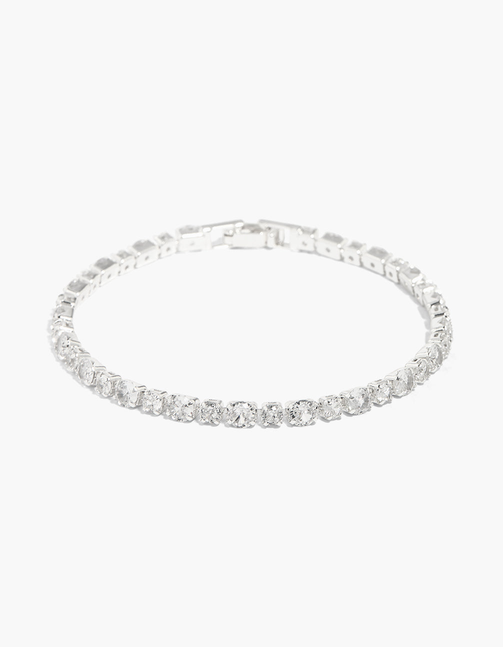 Elegant silver plated large cubic zirconia tennis bracelet featuring statement styling front view