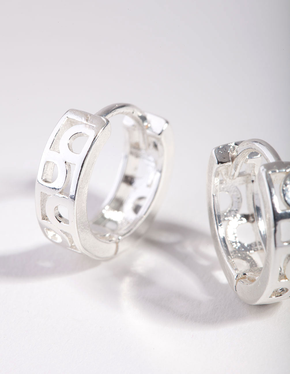 Silver Circle Cutout Huggie Earings