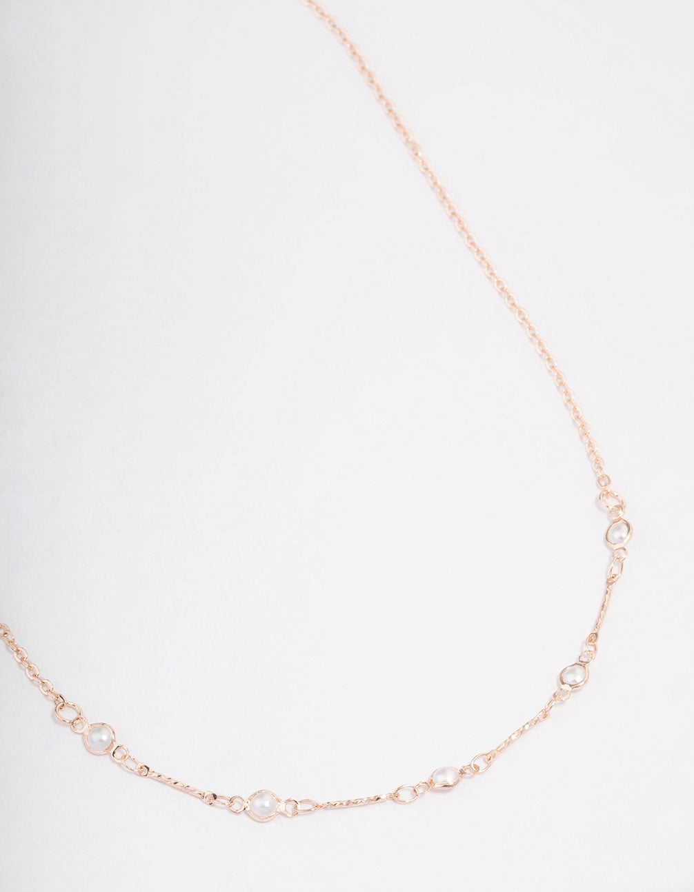 Rose Gold Encased Pearl Station Short Necklace