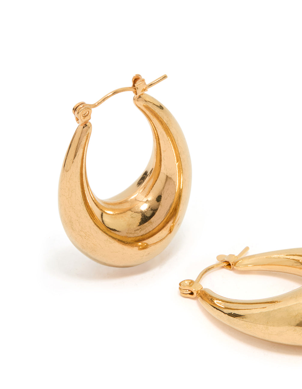Featuring waterproof gold plated stainless steel full loop hoop earrings in gold close up view