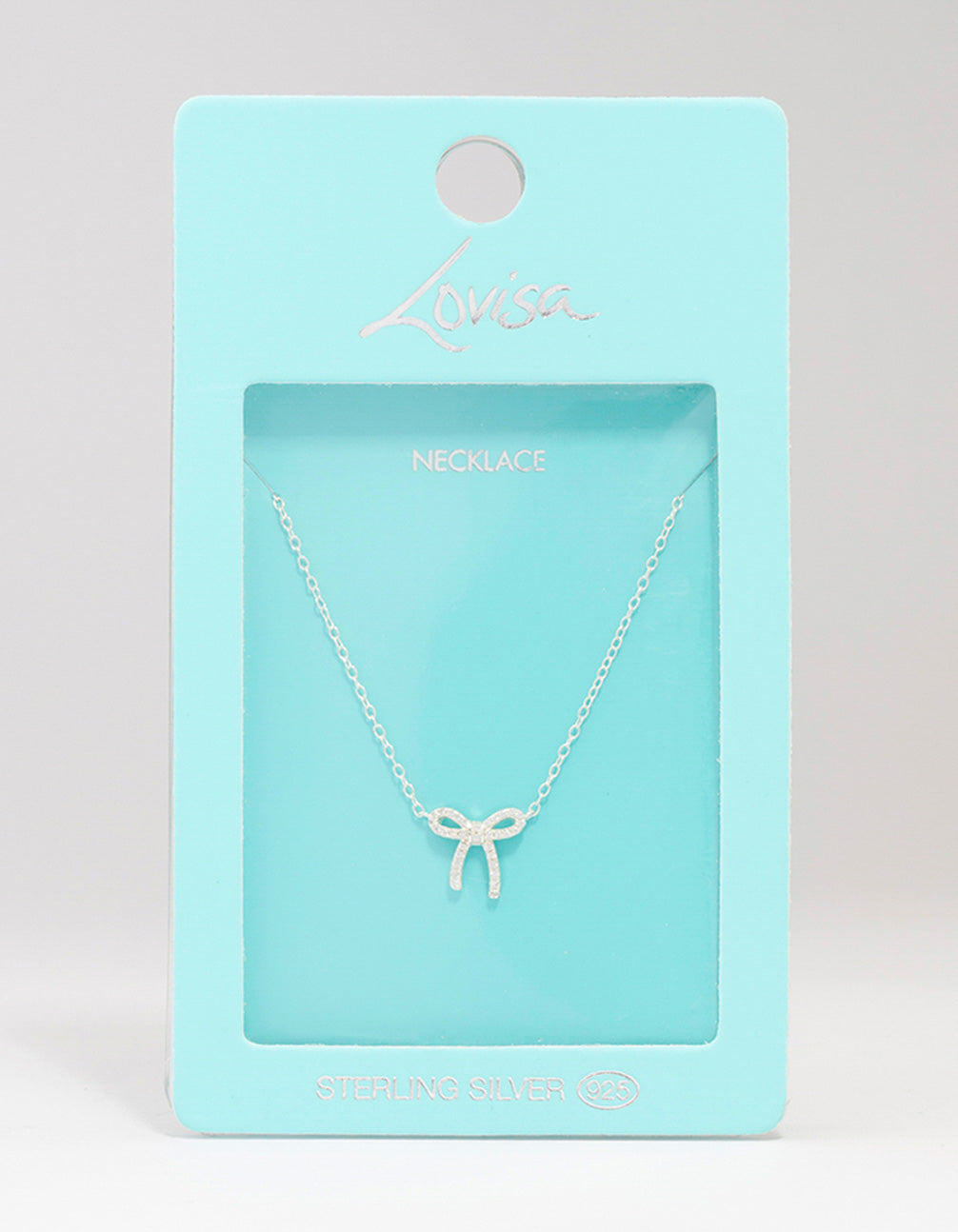 Elegant sterling silver cubic zirconia bow pendant necklace with dainty close up view