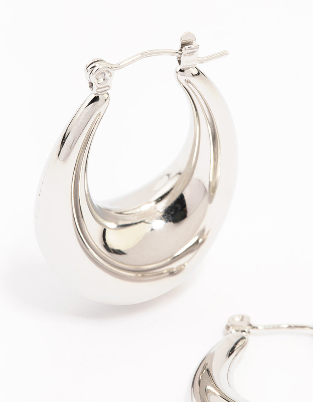 Crafted from waterproof stainless steel full loop drop hoop earrings in silver close up view