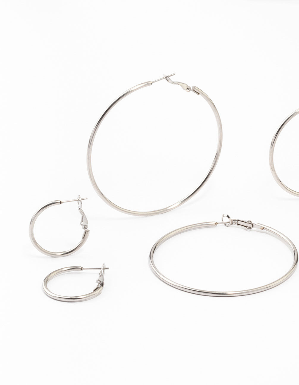 Featuring waterproof stainless steel thin hoop earrings in a silver 3-pack close up view