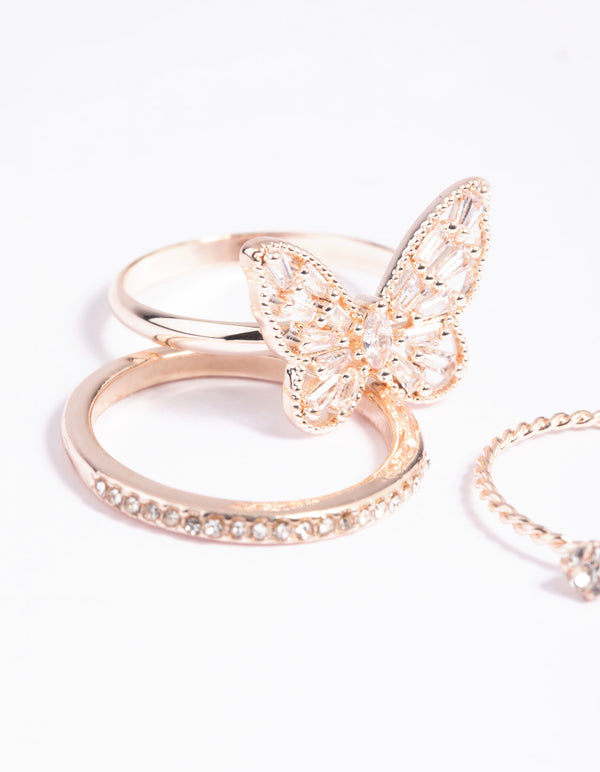 Featuring rose gold butterfly rings close up view