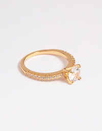 Showcasing a gold plated cubic zirconia round textured band ring with crystal accents close up view - link has visual effect only