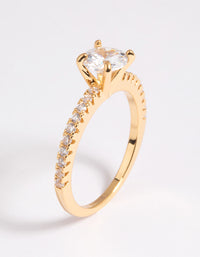Highlighting a gold plated cubic zirconia round textured band ring with crystal prong setting side detail view - link has visual effect only
