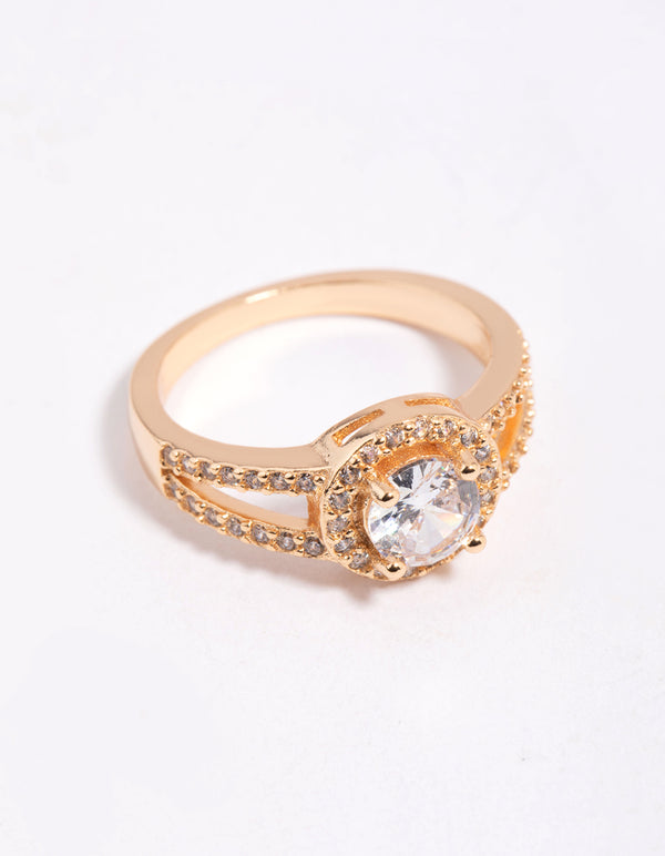 Showcasing a gold plated cubic zirconia halo ring with crystal accents and split band front view