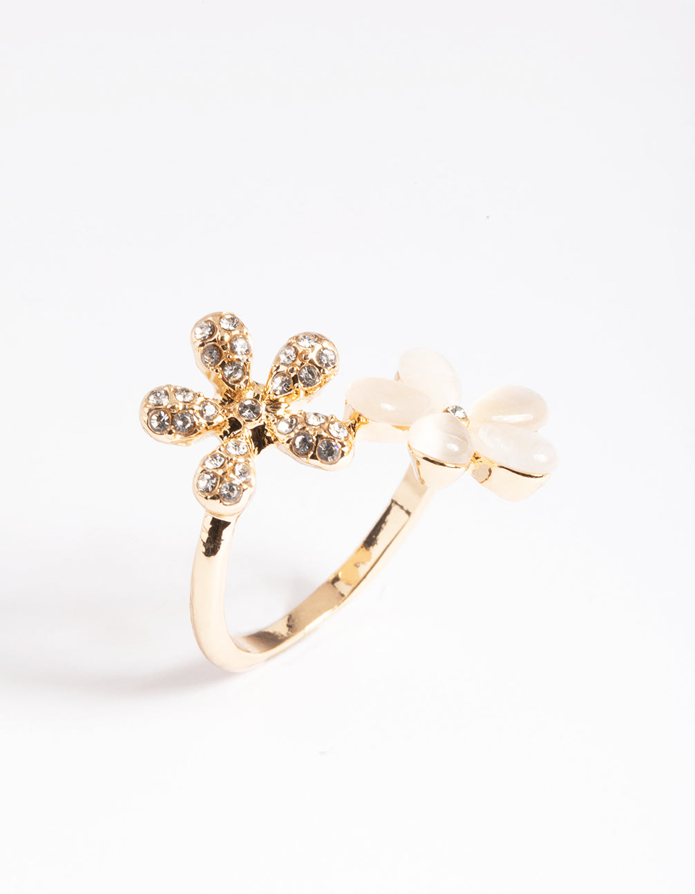 Beautiful gold diamante and cateye flower ring crafted in statement styling close up view