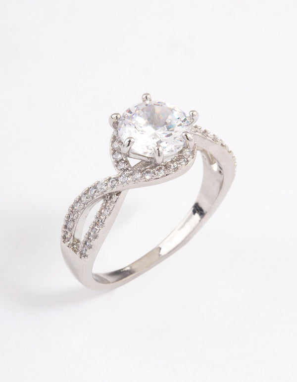 Showcasing a round infinity halo ring with crystal in silver front view