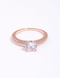 Beautifully crafted rose gold plated cubic zirconia ring featuring round cut stones with textured band design close up view - link has visual effect only