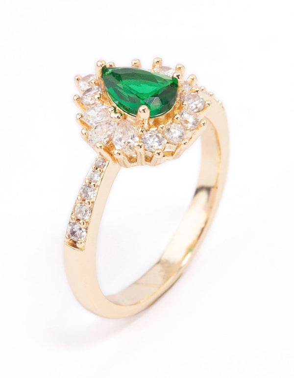 Beautifully crafted gold plated regal ring with pear cut cubic zirconia in green and clear side detail view
