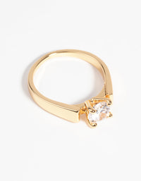 Showcasing a statement gold plated ring with cubic zirconia crystal in clear front view - link has visual effect only