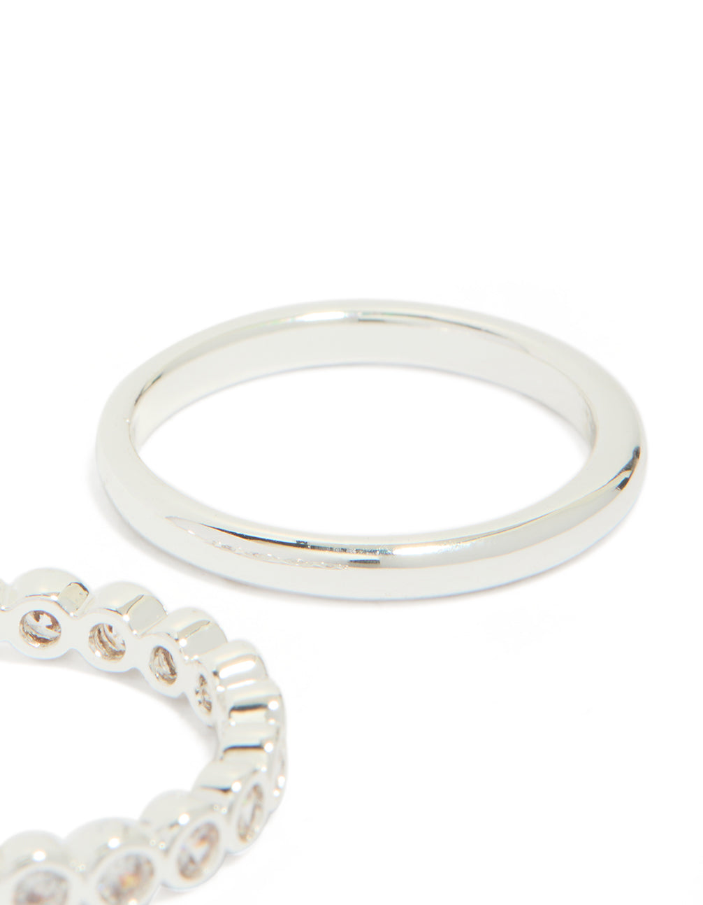Designed with silver plated fine round cubic zirconia stacking rings 3-pack close up view