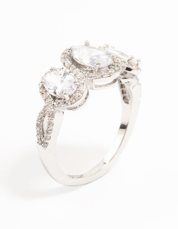 Elegant ring featuring three oval cut cubic zirconia stones with halo settings in silver side detail view