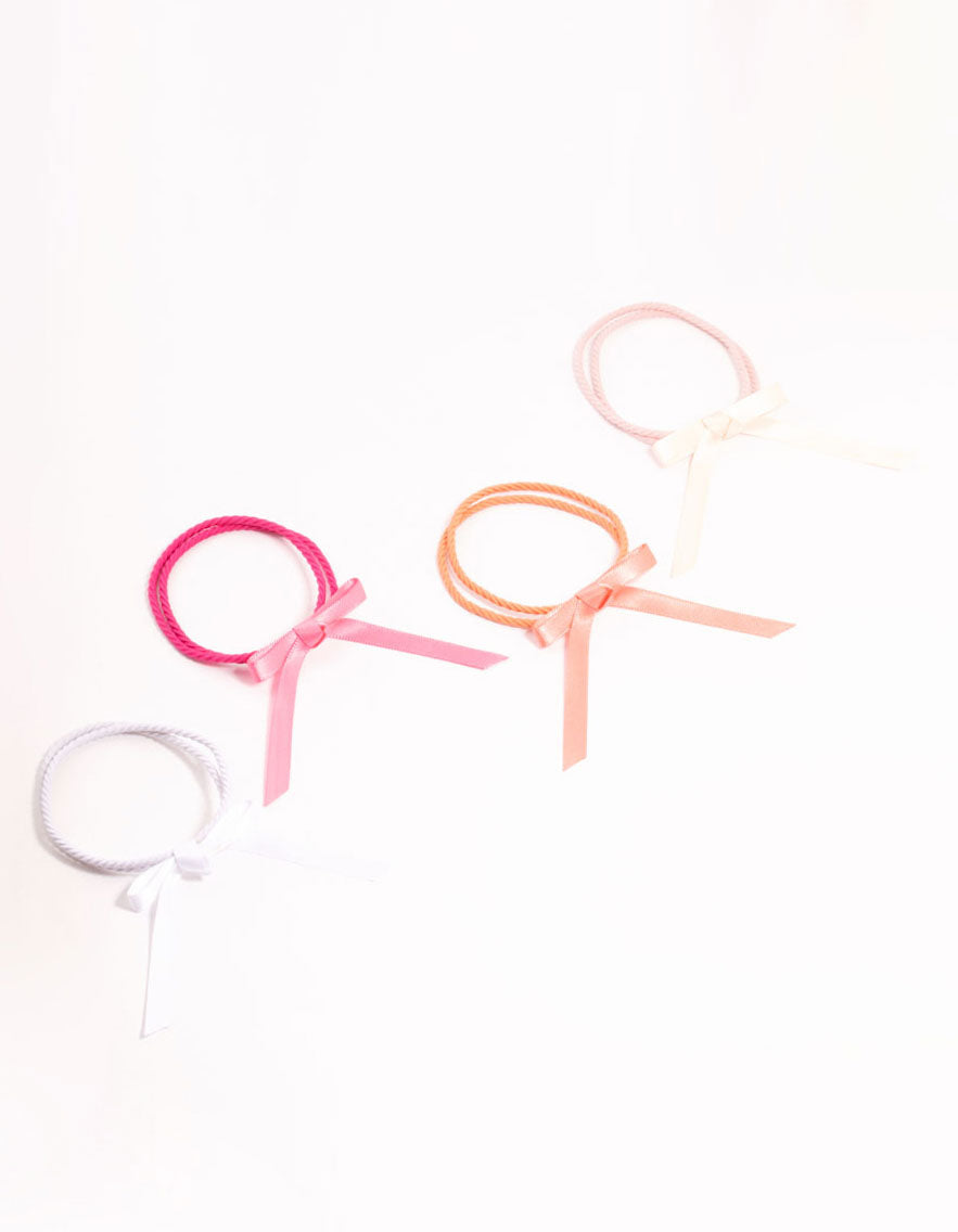 Showcasing thin fabric bow hair ties in a 4-pack with solid pink, white, hot pink, and coral tones front view