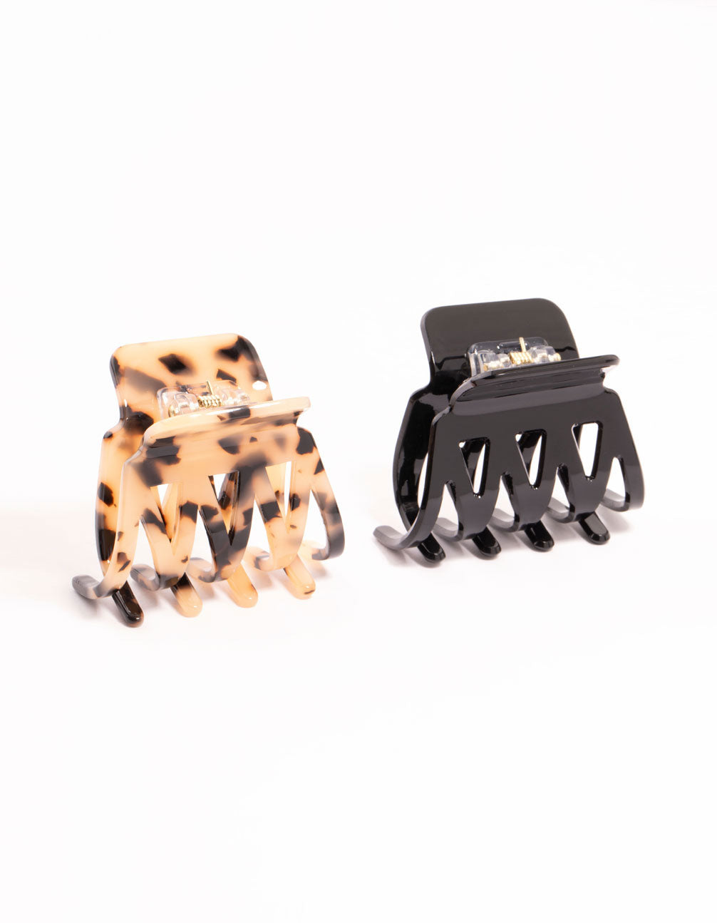 Set of small acrylic zig zag claw clips in tortoiseshell pattern, featuring black, saddle brown, and yellow colors, 2-pack front view