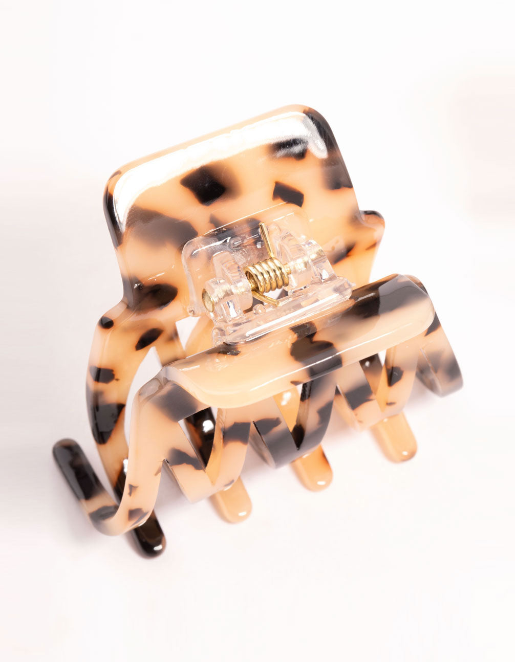 Set of small acrylic zig zag claw clips in tortoiseshell pattern, featuring black, saddle brown, and yellow colors, 2-pack detail view