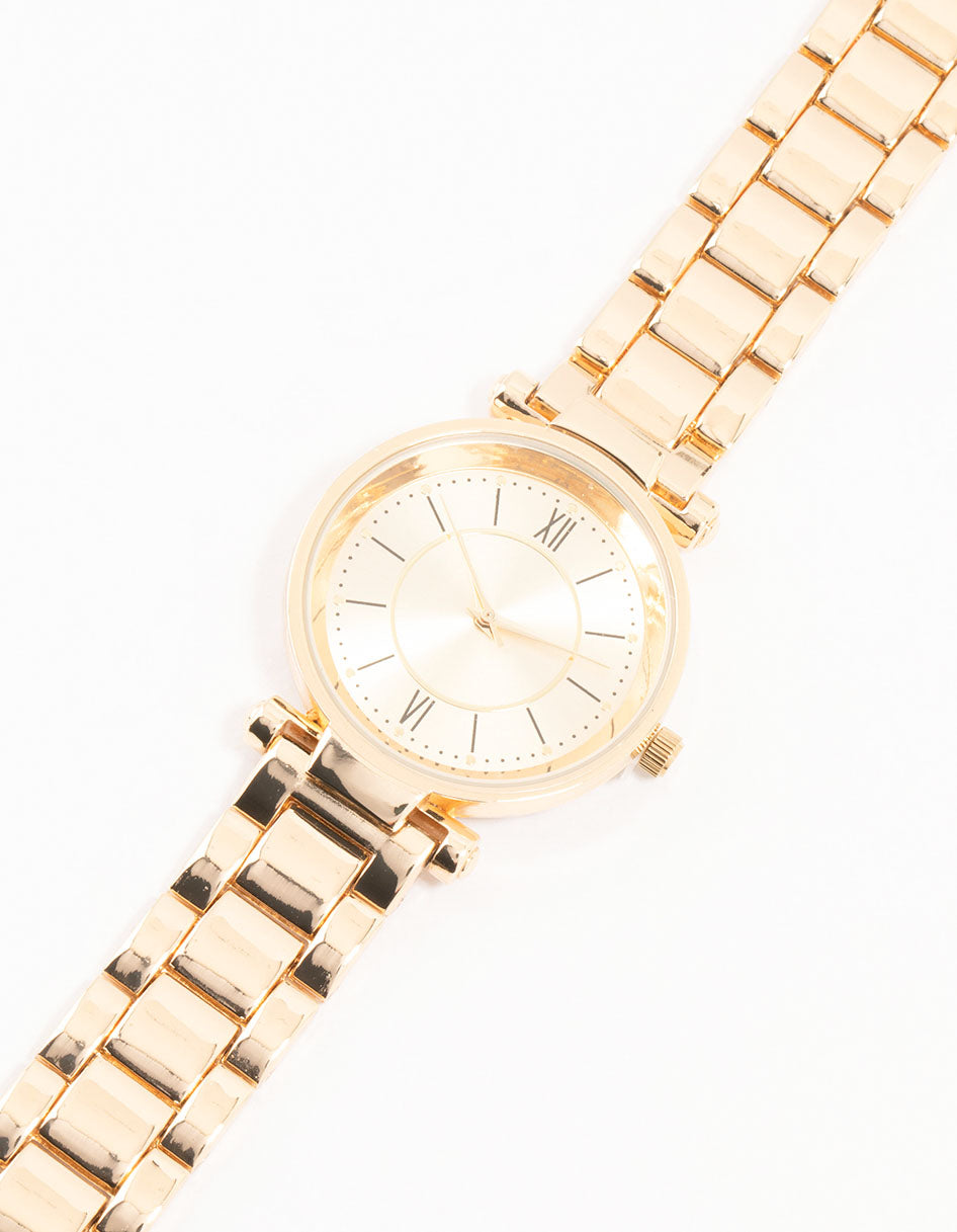 Elegant gold round roman numeral watch featuring white dial, formal styling, women's analog timepiece with link band watch face detail view