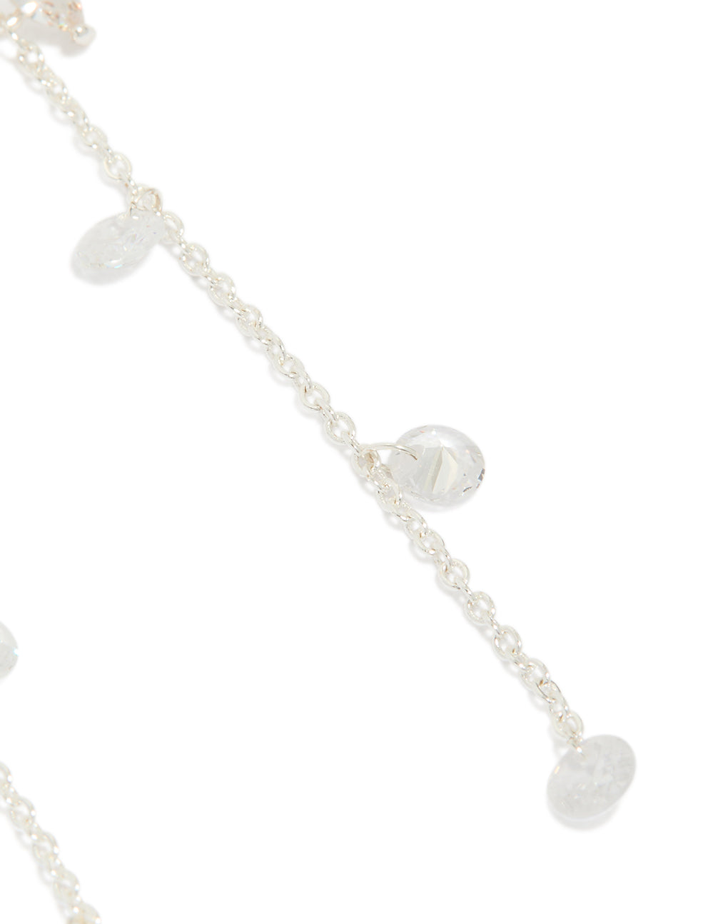 Delicately designed silver plated cubic zirconia flower station drop earrings with floral charm accents post detail view