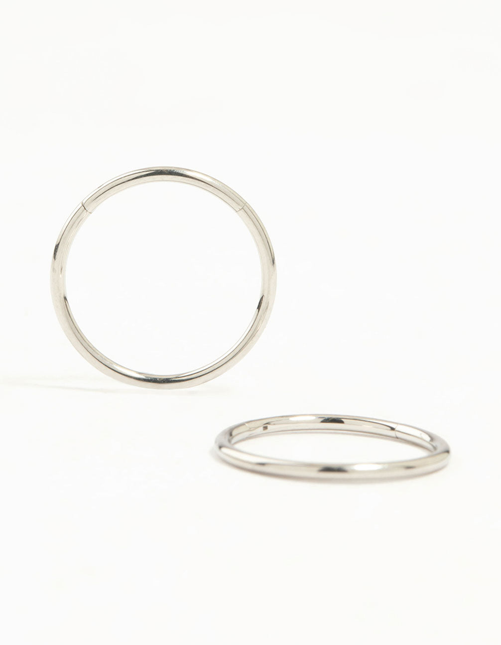 Featuring surgical steel medium sleeper earrings, 12 mm in silver front view