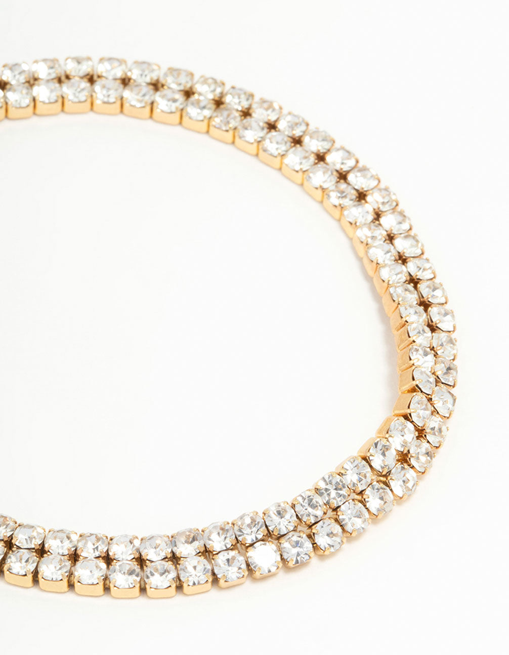 Featuring waterproof gold plated stainless steel diamante layered tennis bracelet close up view