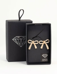 Gold Cubic Zirconia Bow Stud Earrings - link has visual effect only