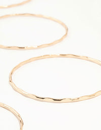 Gold Hammered Flat Bangles 9-Pack - link has visual effect only