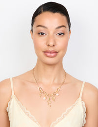 Gold Plated Pearl & Snake Charm Necklace - link has visual effect only