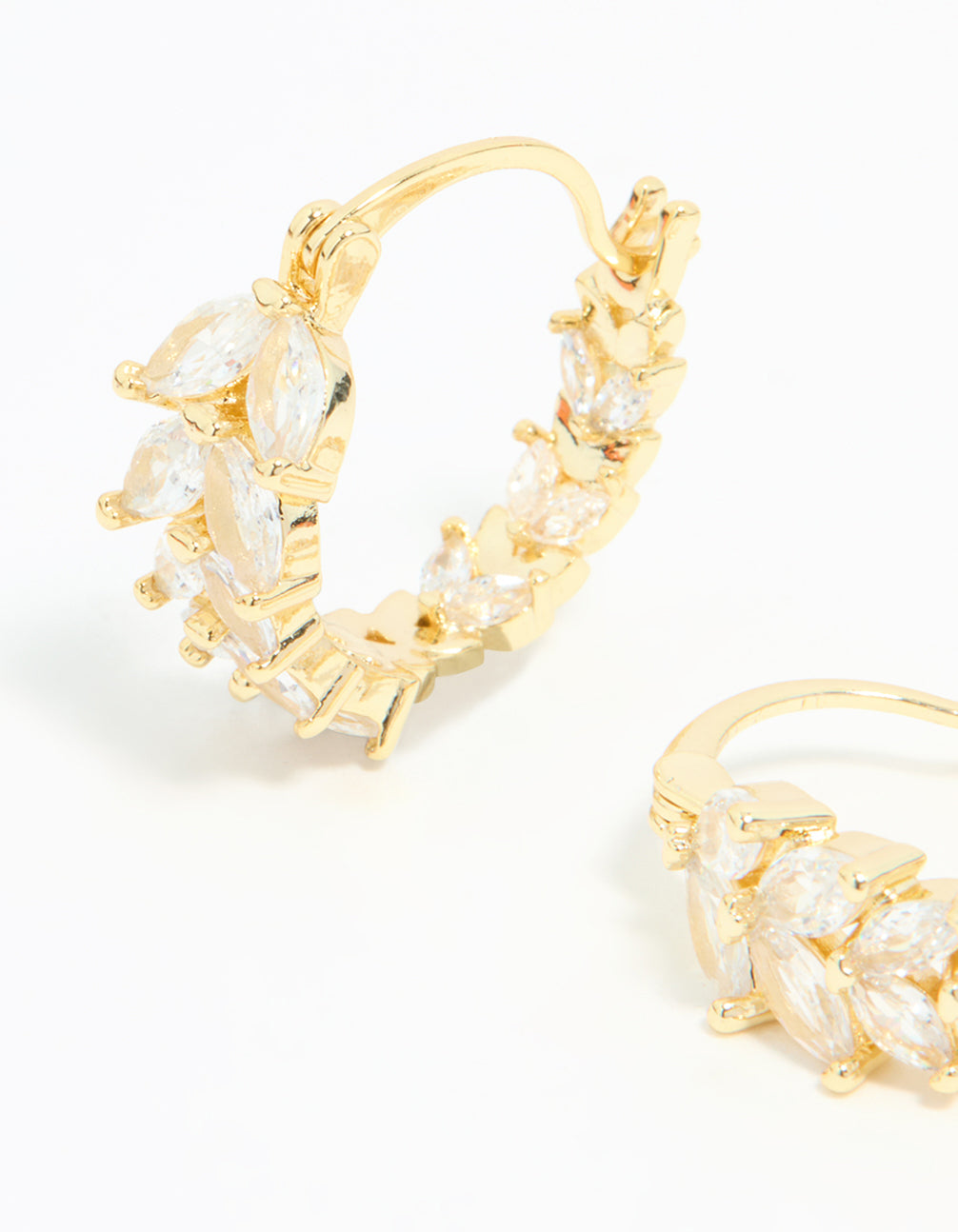 Detailed view of gold plated cubic zirconia vine hoop earrings with crystal accents in clear close up view