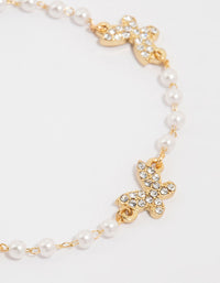 Gold Plated Pearl & Butterfly Charm Bracelet - link has visual effect only
