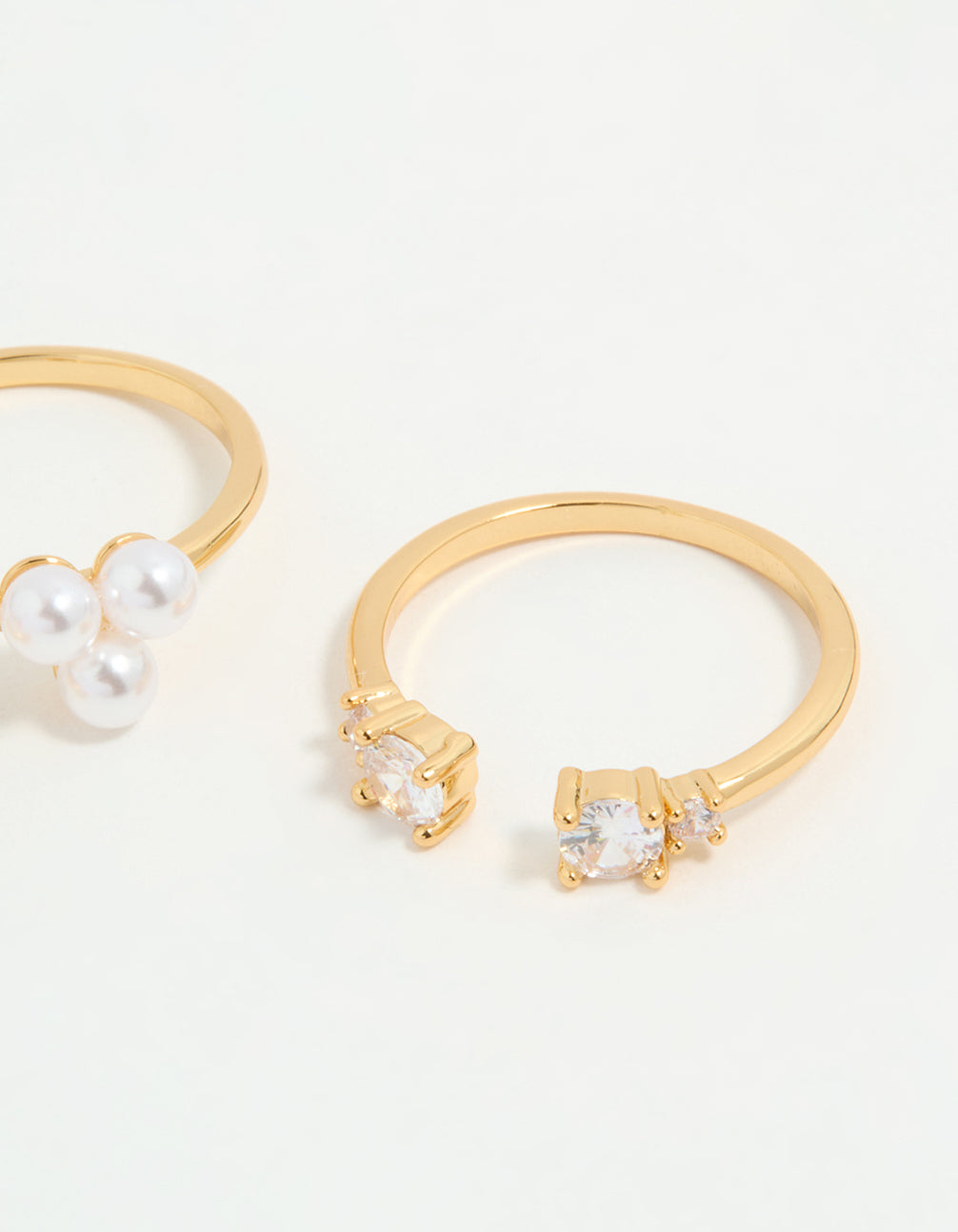 Crafted from gold plated material with cubic zirconia and pearl accents 3-pack side detail view
