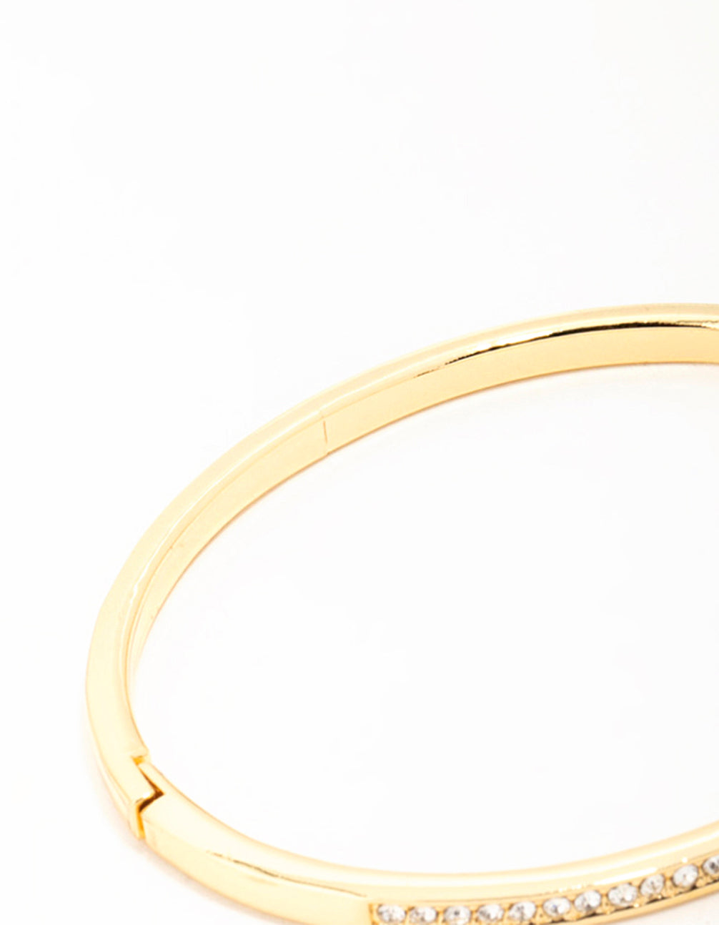 Featuring a gold diamante hinged bangle closure detail view