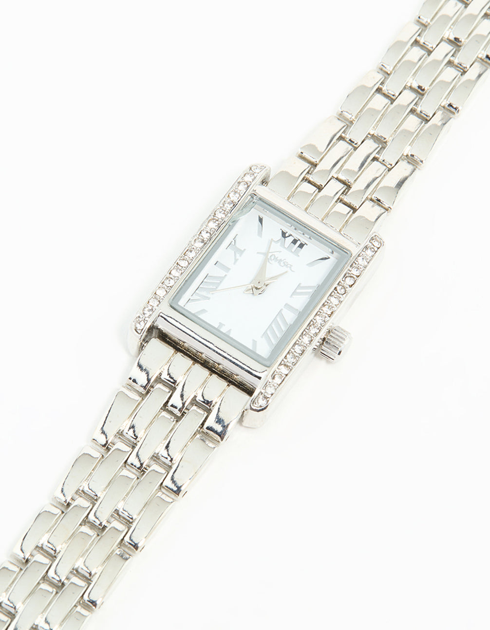Beautifully crafted diamante roman numeral rectangle watch with white dial, formal occasion styling, link band strap, analog type, and women's design in silver watch face detail view