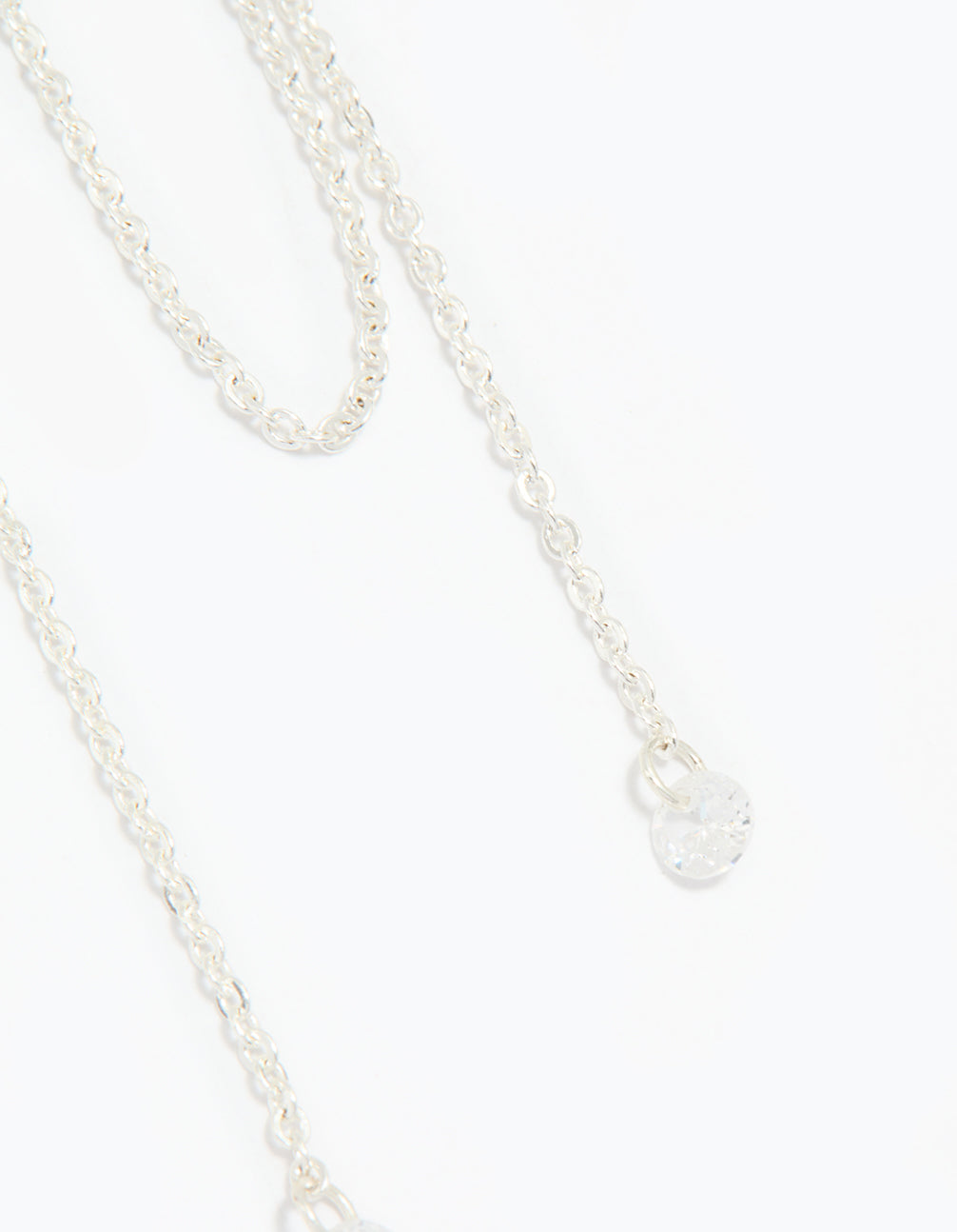 Silver Cubic Zirconia Loop Chain Huggie Earrings