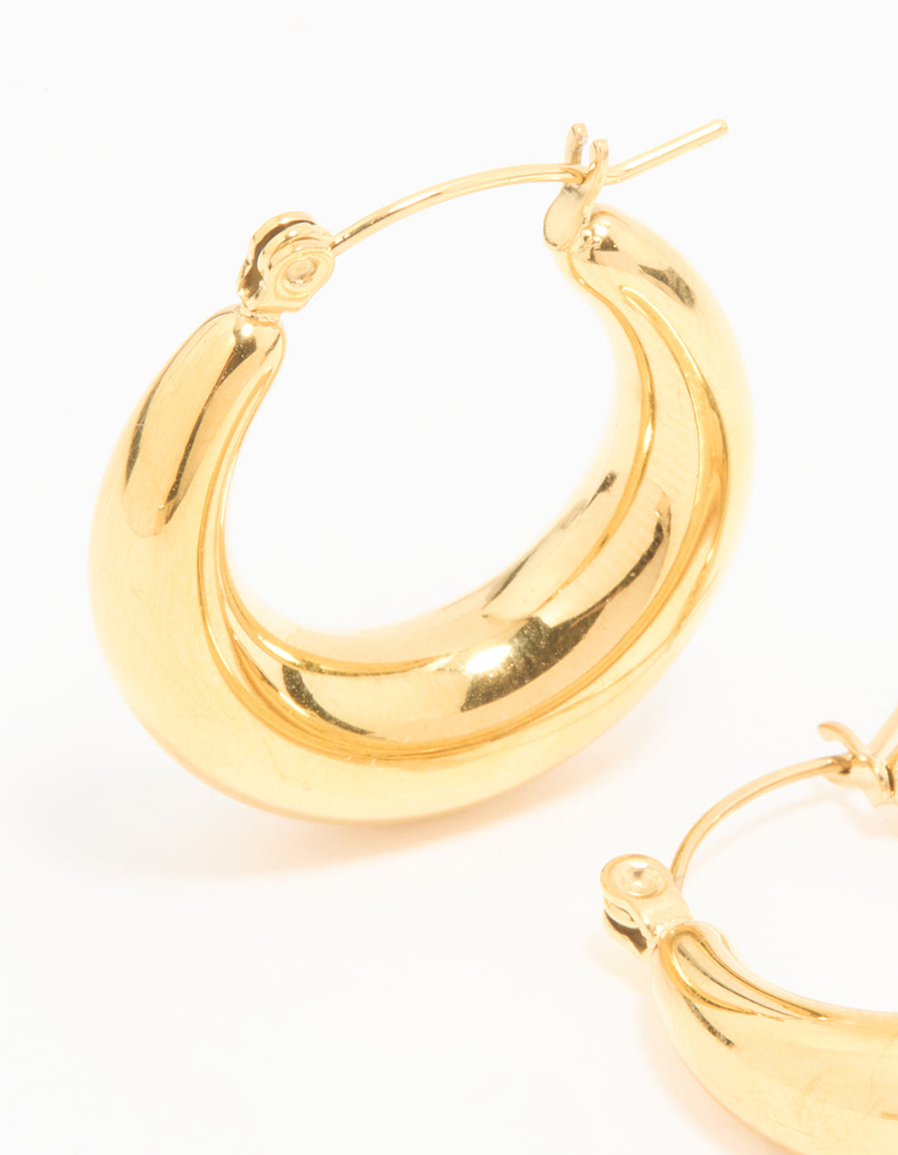 Featuring waterproof small chunky hoop earrings in gold plated stainless steel close up view