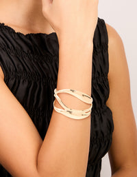 Gold Abstract Waves Wrist Cuff - link has visual effect only