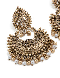 Showcasing antique gold teardrop pearl boho earrings with intricate beads, charm, and floral detailing close up view - link has visual effect only